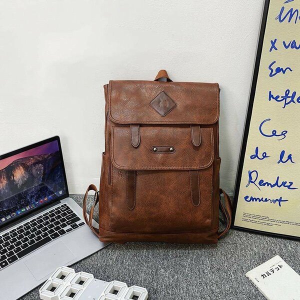 Waterproof leather laptop travel backpack school bag