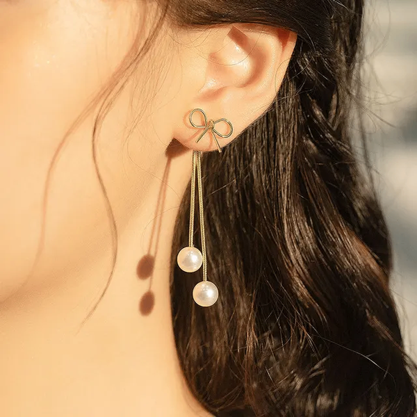 Boucle d'oreille avec des perles