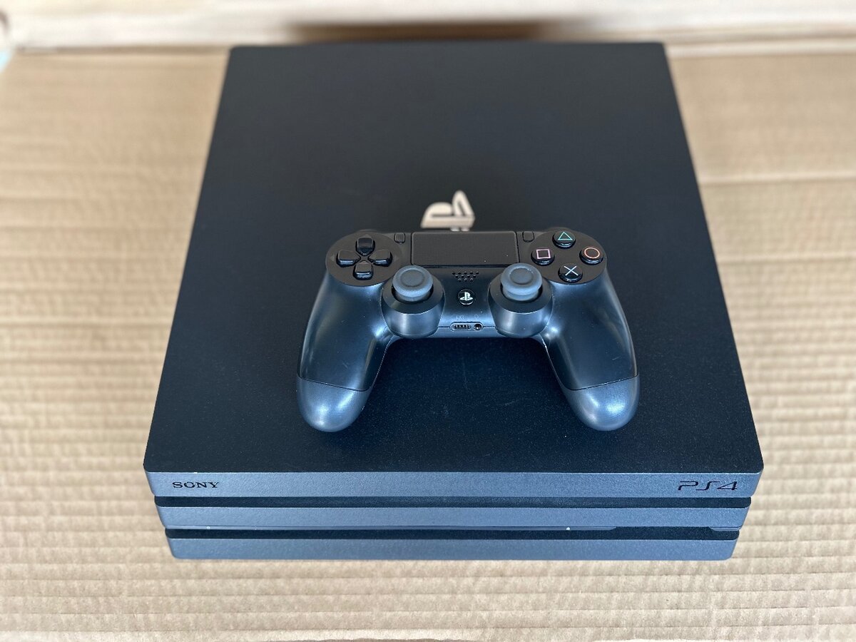 Console PS4 Pro 8jeux