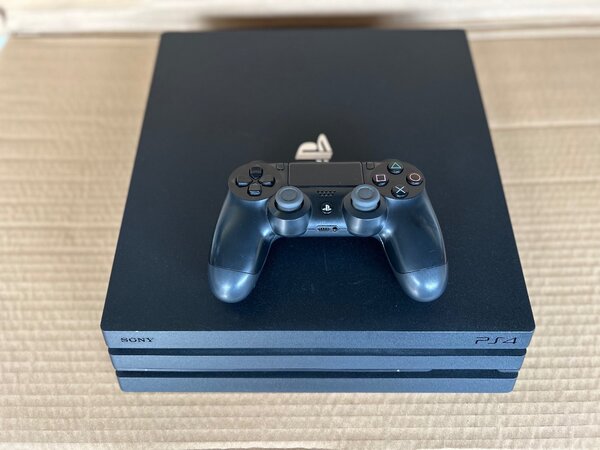Console PS4 Pro 8jeux