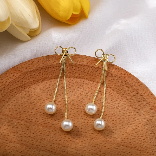 Boucle d'oreille avec des perles
