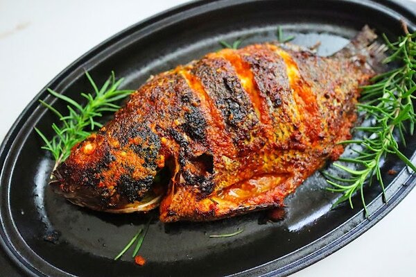 Charcoal Grilled Tilapia &Banku