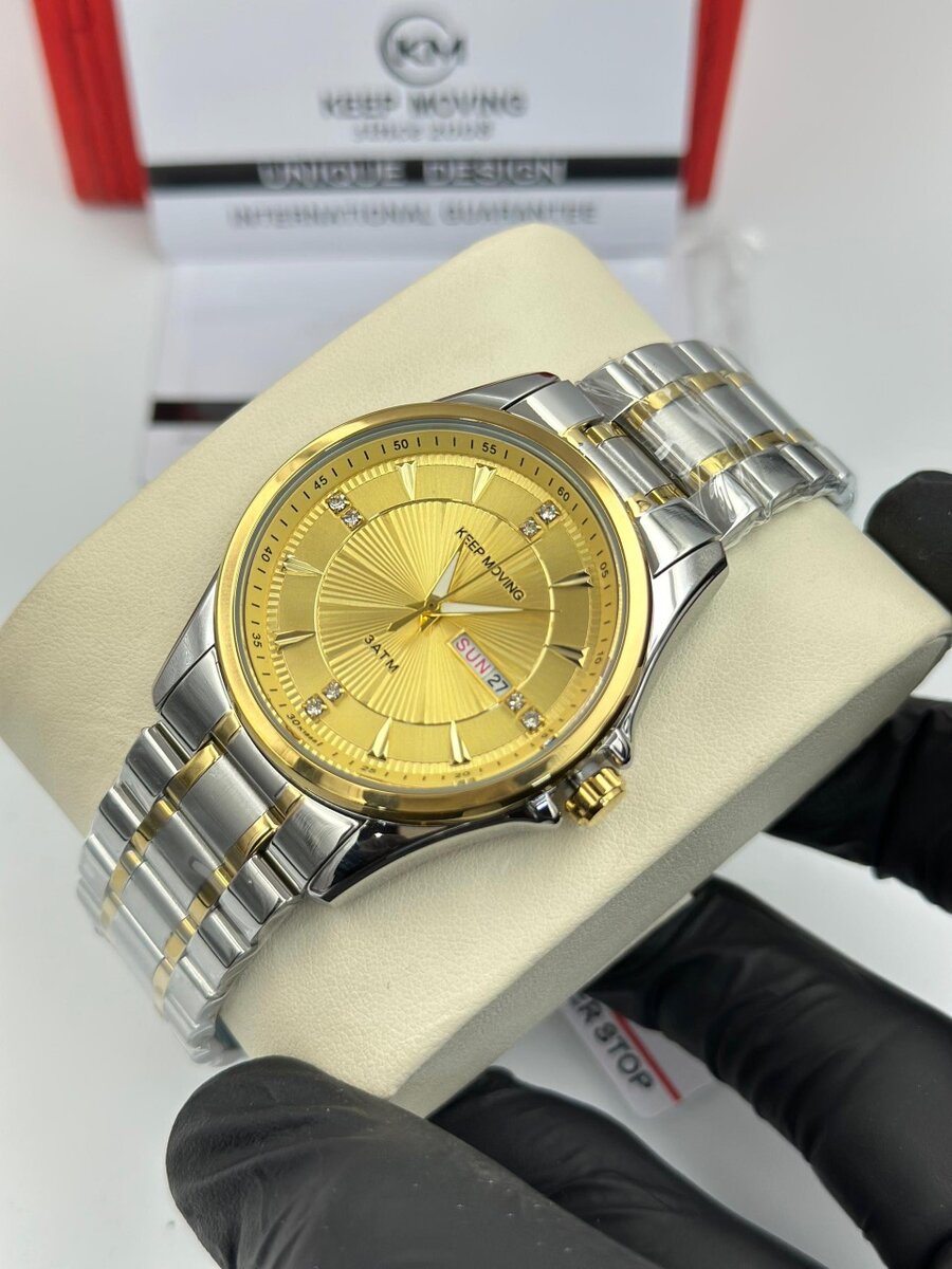 Montre Homme Or et Argent Élégante