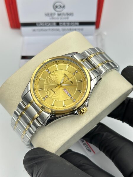 Montre Homme Or et Argent Élégante