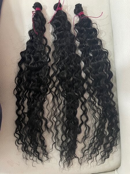 Extensions cheveux bouclés