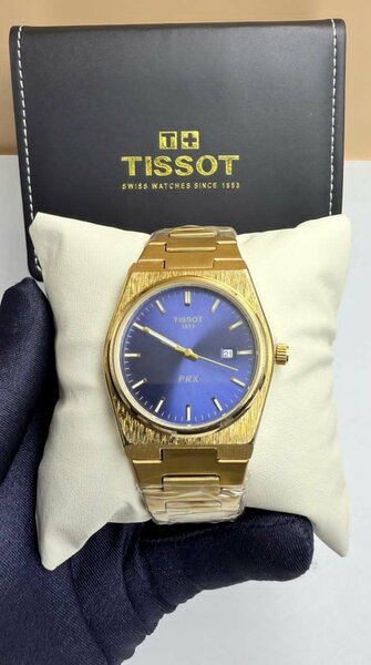 Montre Tissot PRX dorée
