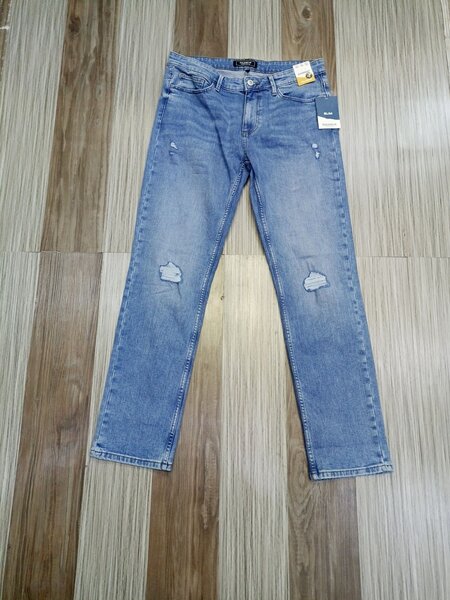 Stylish jeans with blue shade 