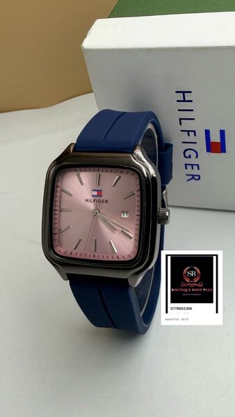 Montre tommy avec sa boîte