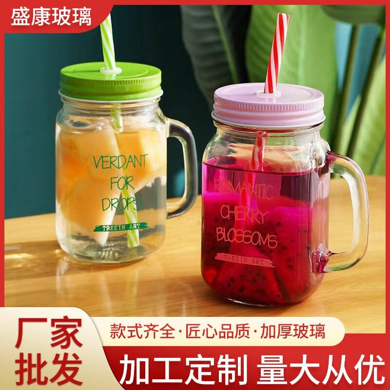 Glass cup with straw