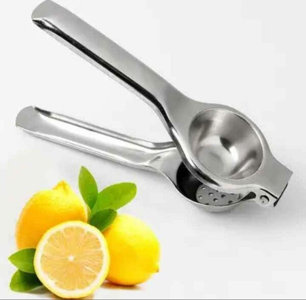 Presse citron manuel en acier inoxydable.