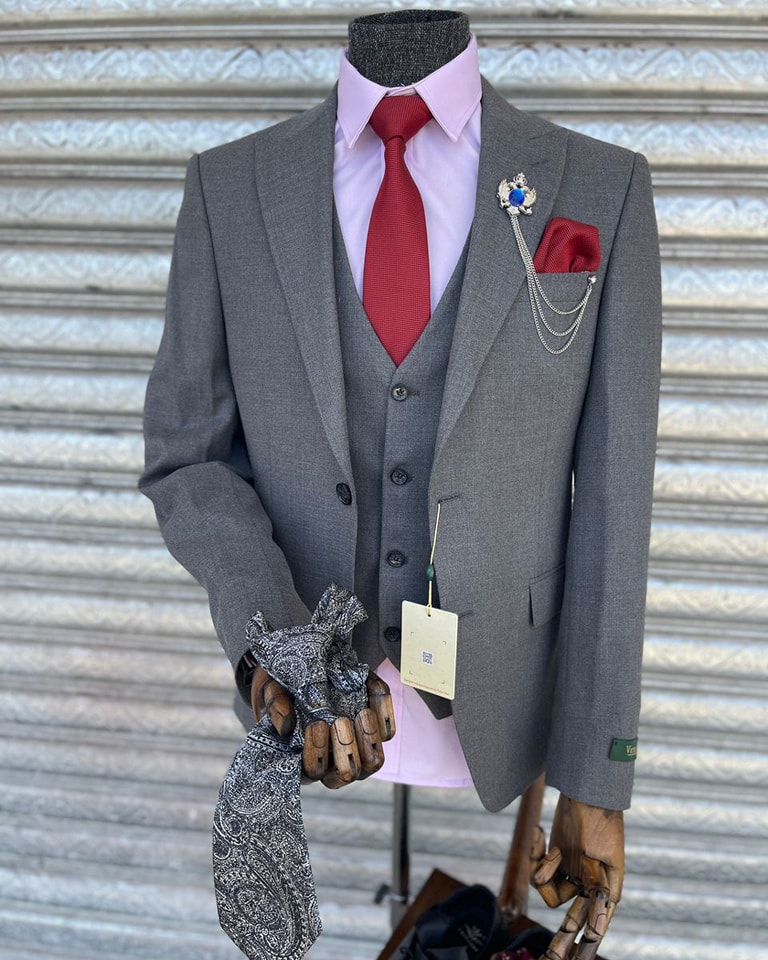 Charcoal grey suit.