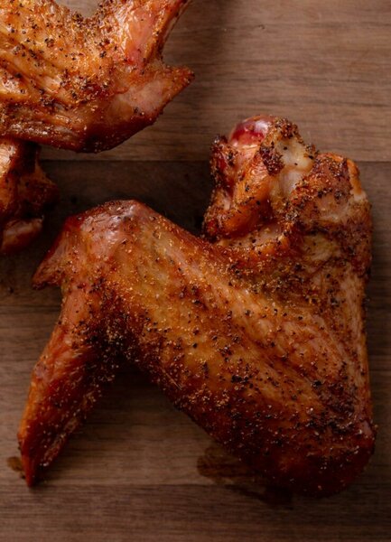 Fresh seasoned chicken and turkey wings