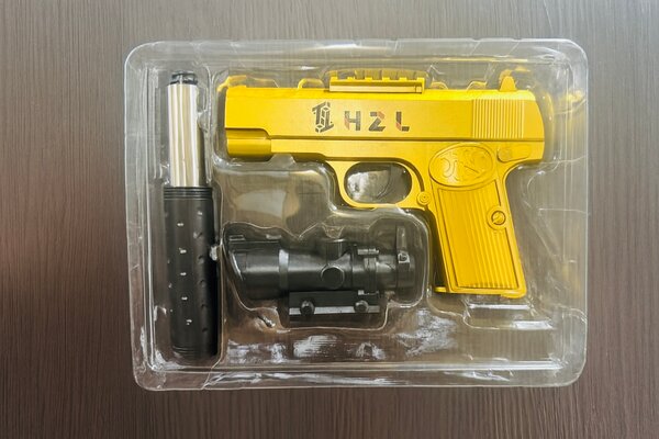 Pistolet jouet avec accessoires
