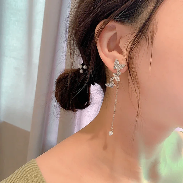 Boucle d'oreille en forme de papillon