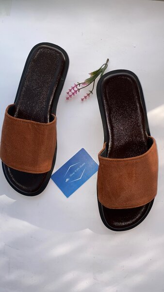 Brown unisex footwear