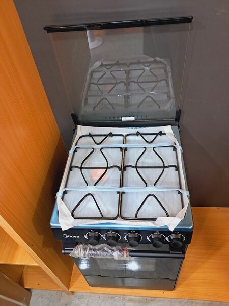 New Midea 4 burner gas stove with oven and Grill