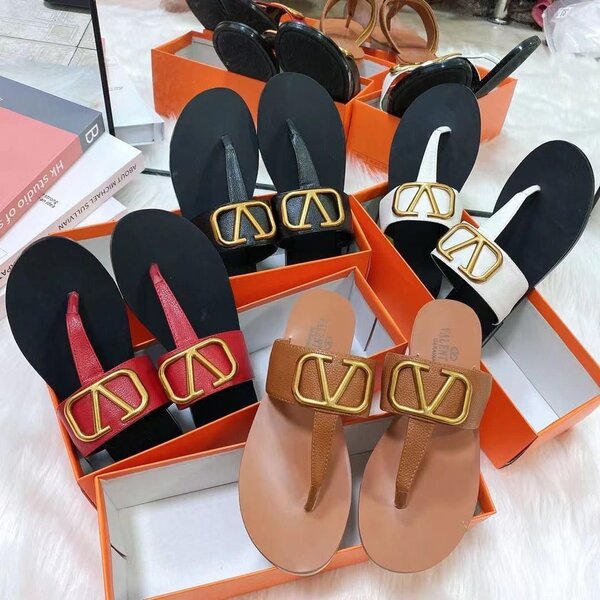 Gucci slippers and Herms slippers