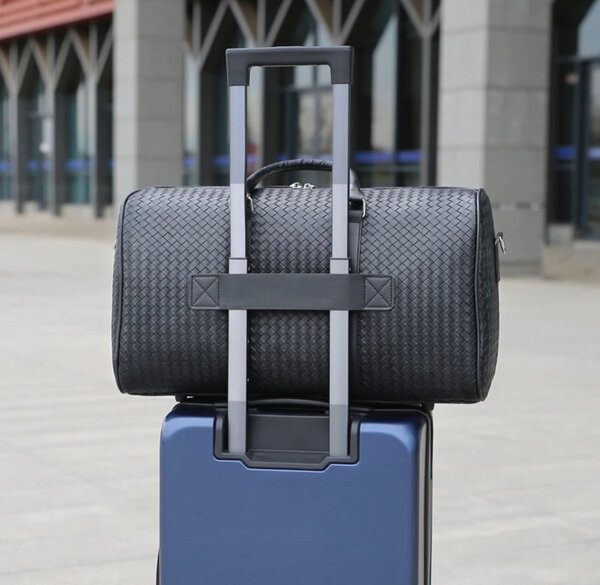Sac de voyage tressé noir