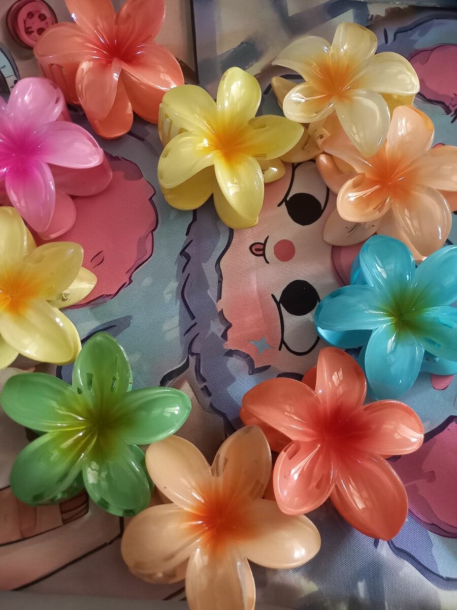 Pince à cheveux fleur colorée