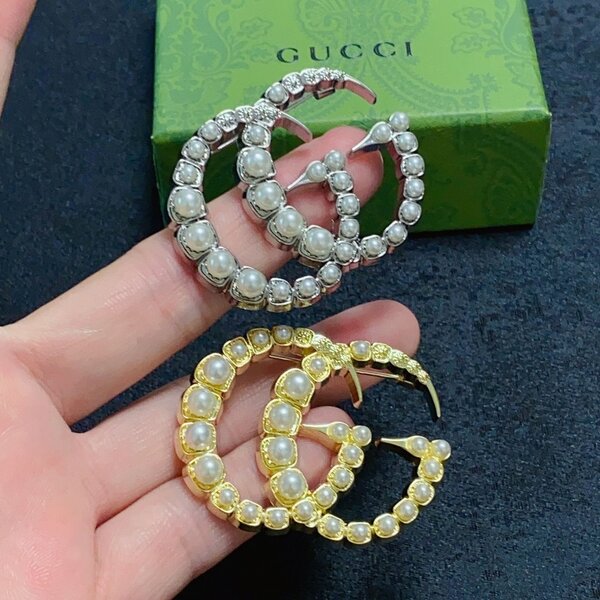 Broche élégante perles dorée