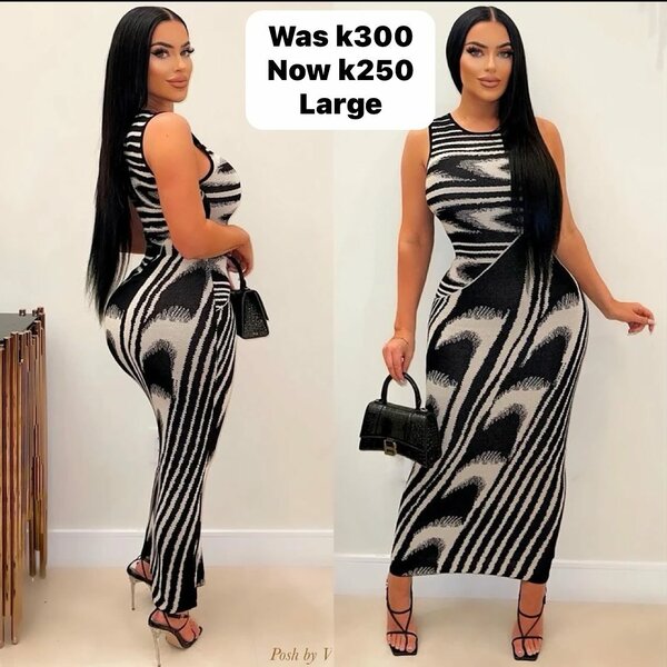 Women's figure-hugging dress with black and white print , off-the-shoulder
