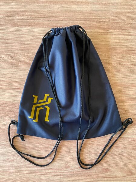 The Kay Brand Drawstring Backpack