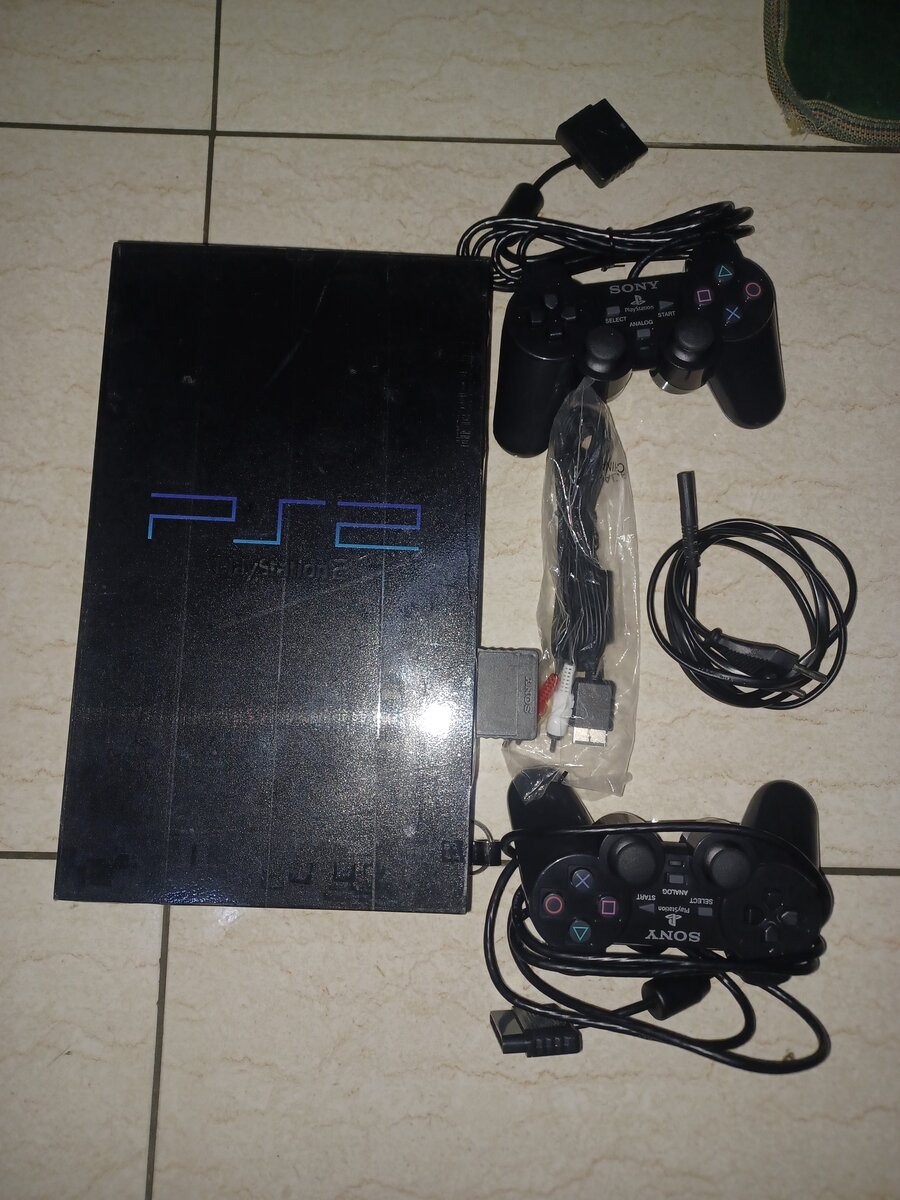 Ps2 craque +2 manettes 27 jeux