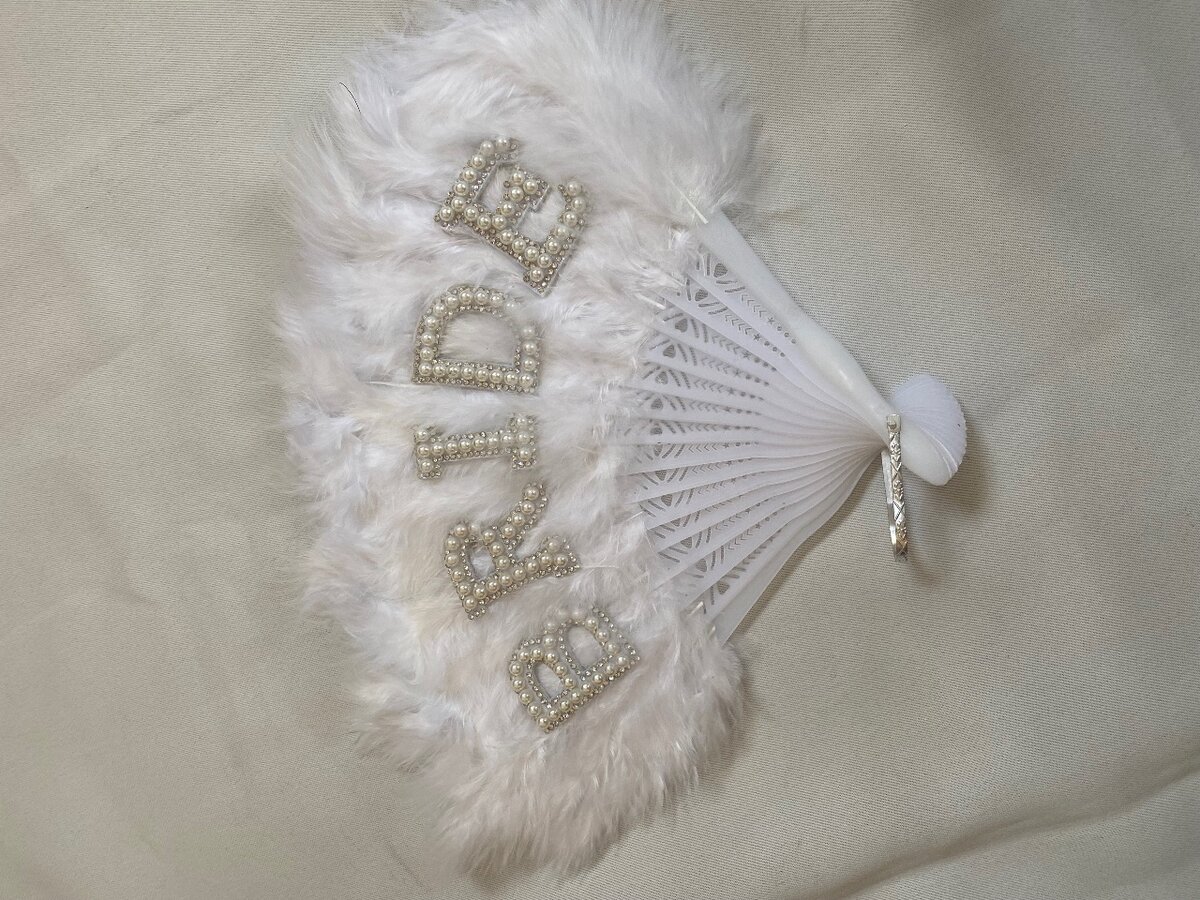 Sash, crown and fan