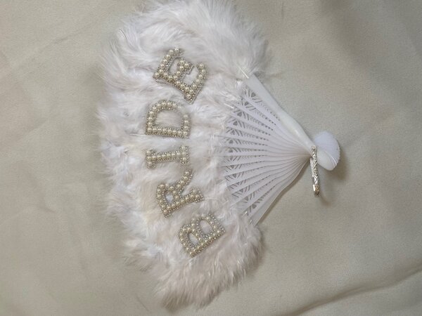 Sash, crown and fan