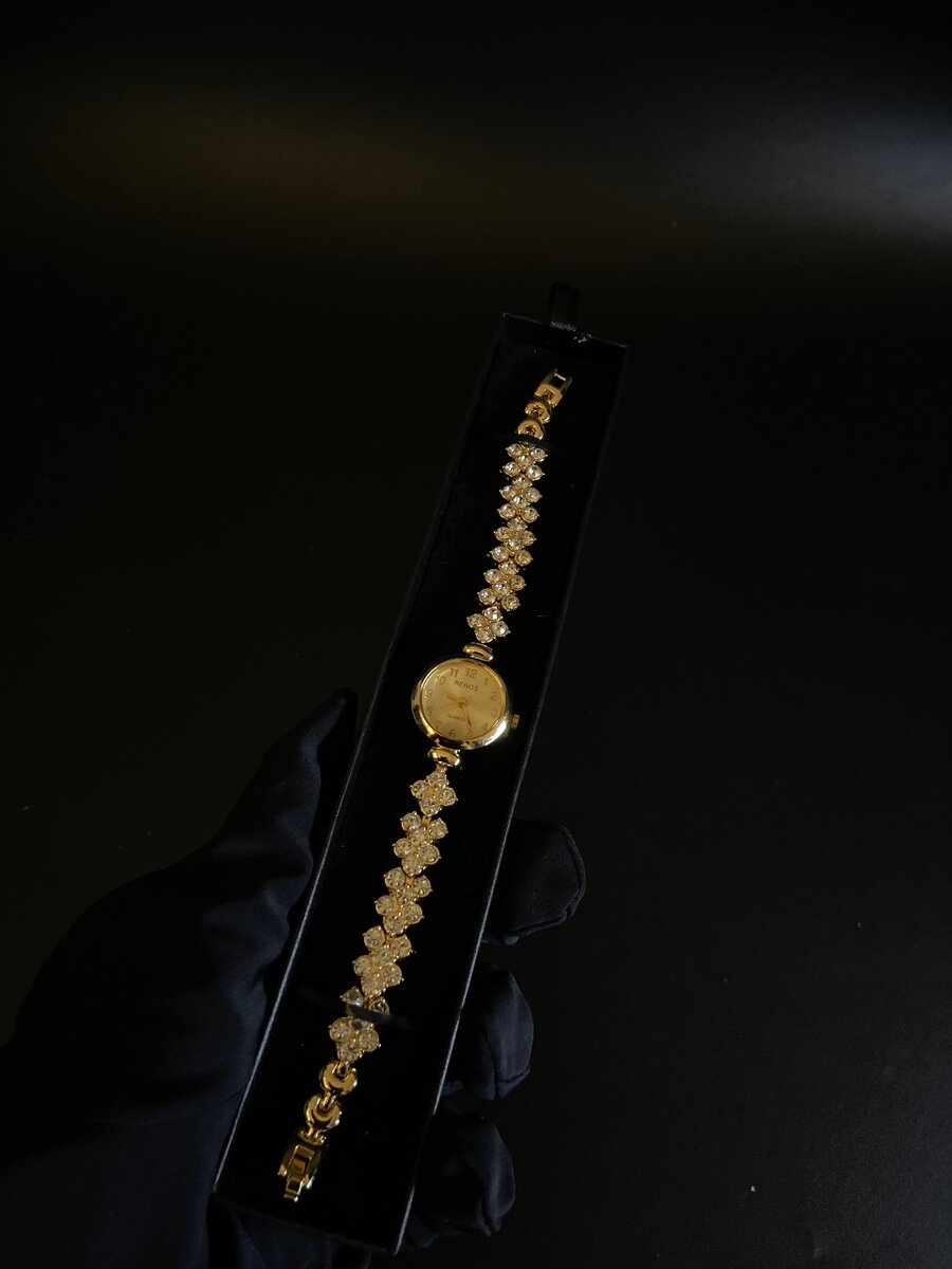 Gold tone watch