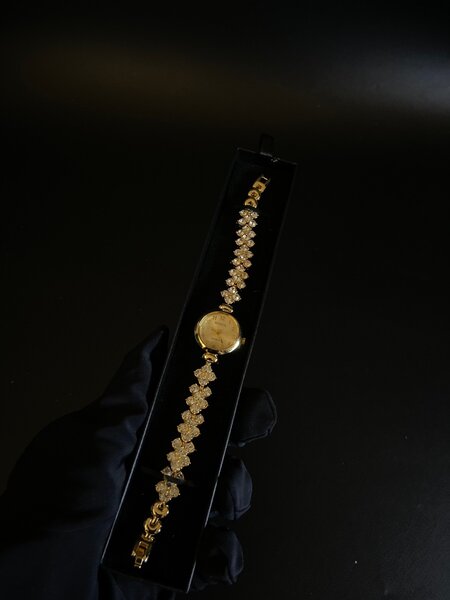 Gold tone watch