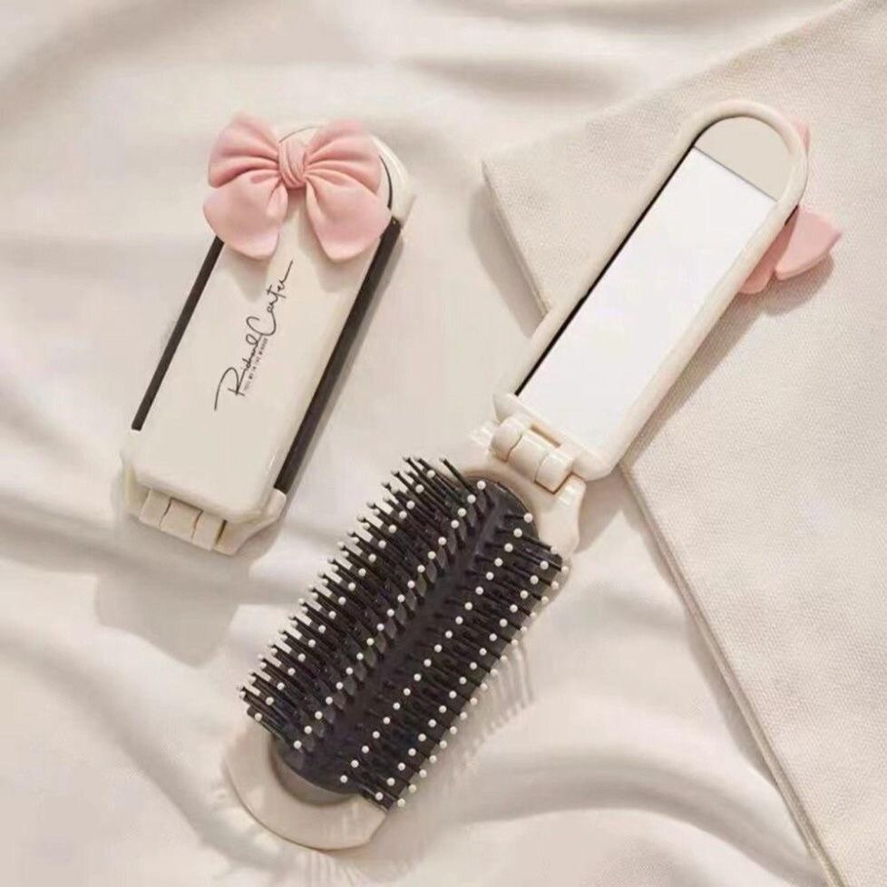 Brosse à cheveux pliante avec miroir