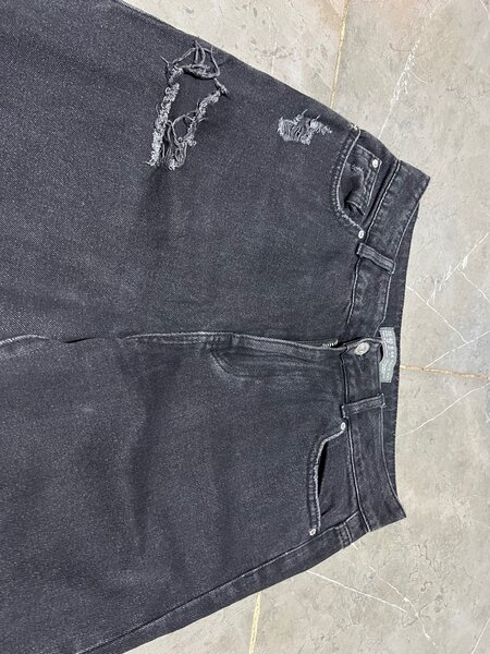 Tattered mom jeans