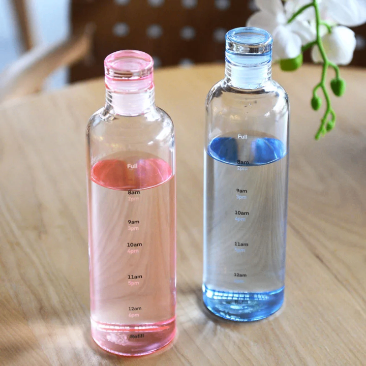 Bouteille d'eau graduée élégante