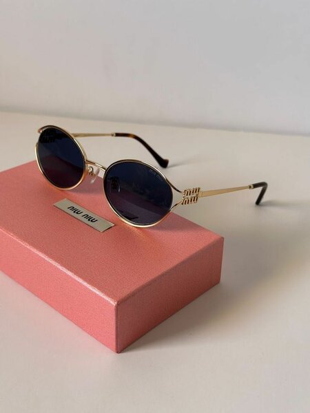 Lunettes de soleil miu  miu