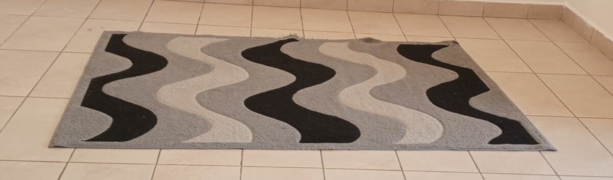 Tapis bien lourd