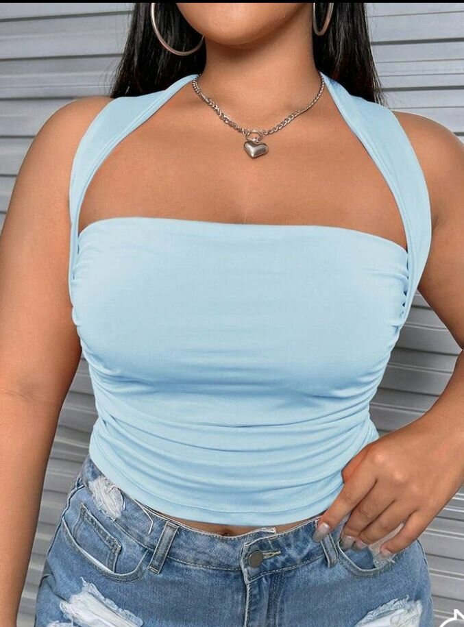 Top bleu sans manches élégant