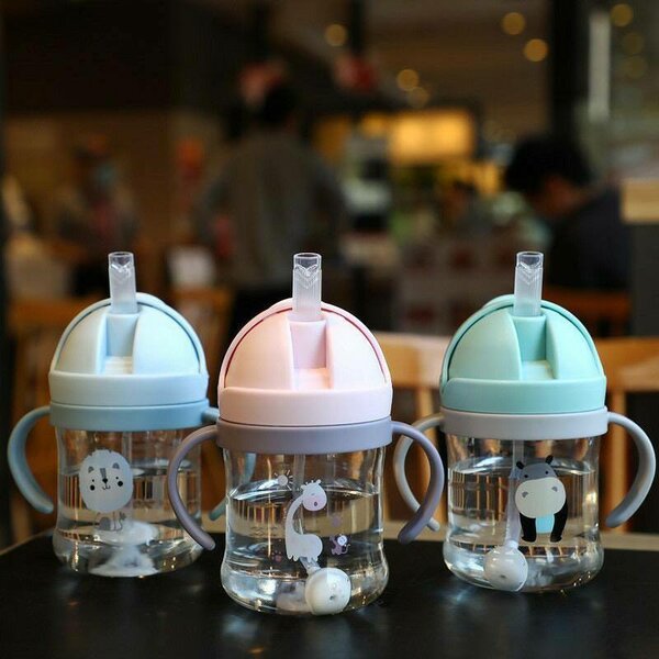 Nursing bottle with straw