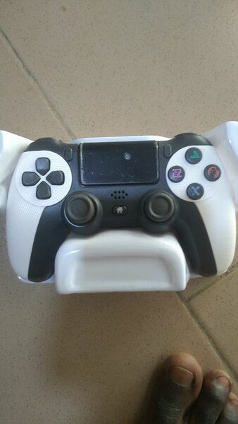 Manette PS4 et téléphone