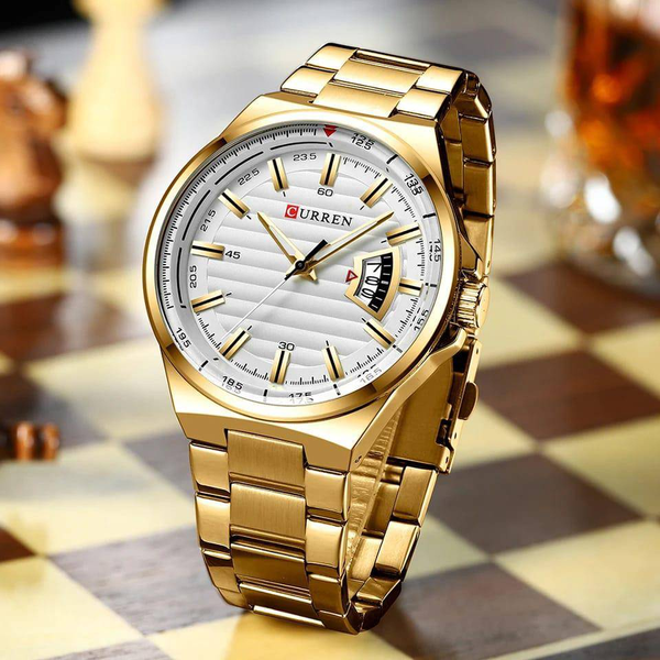 gold curren watch