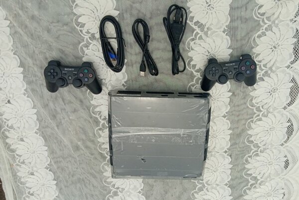 PS3 slim craquée 20 jeux