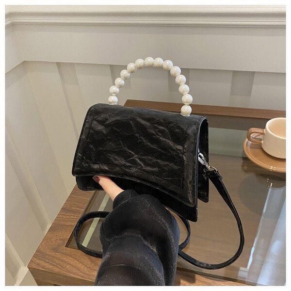 Sac à main en velours