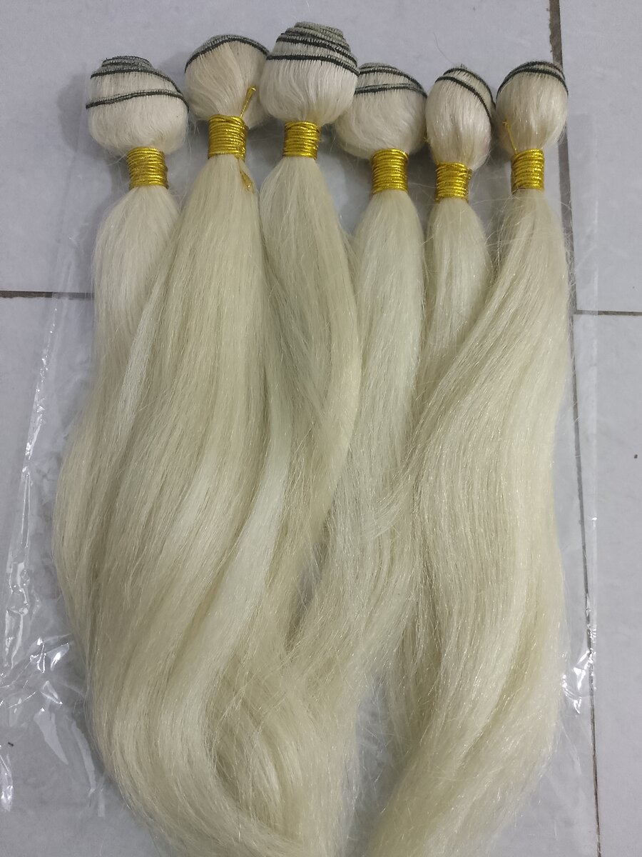 Extensions cheveux blonds soyeux