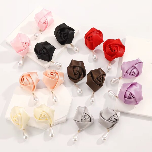 Boucles d'oreilles roses et perles