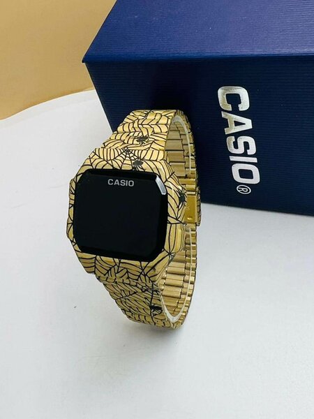 MONTRE CASIO TACTILE (OR, BLANC)