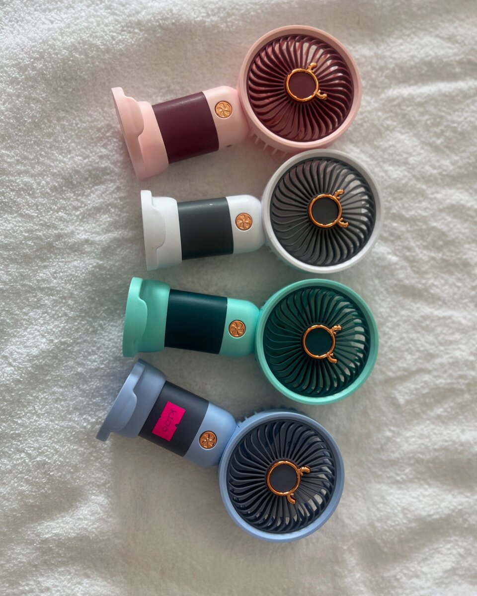 Hand held fans
