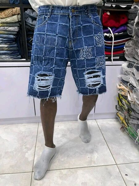 Short en jean déchiré homme