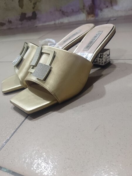 Mules élégantes en cuir