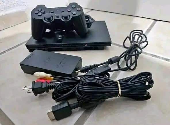 Console PS2 avec manettes