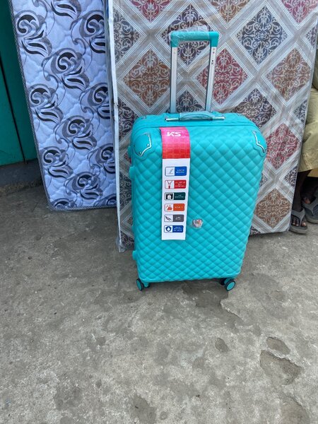 Valise à roulettes turquoise